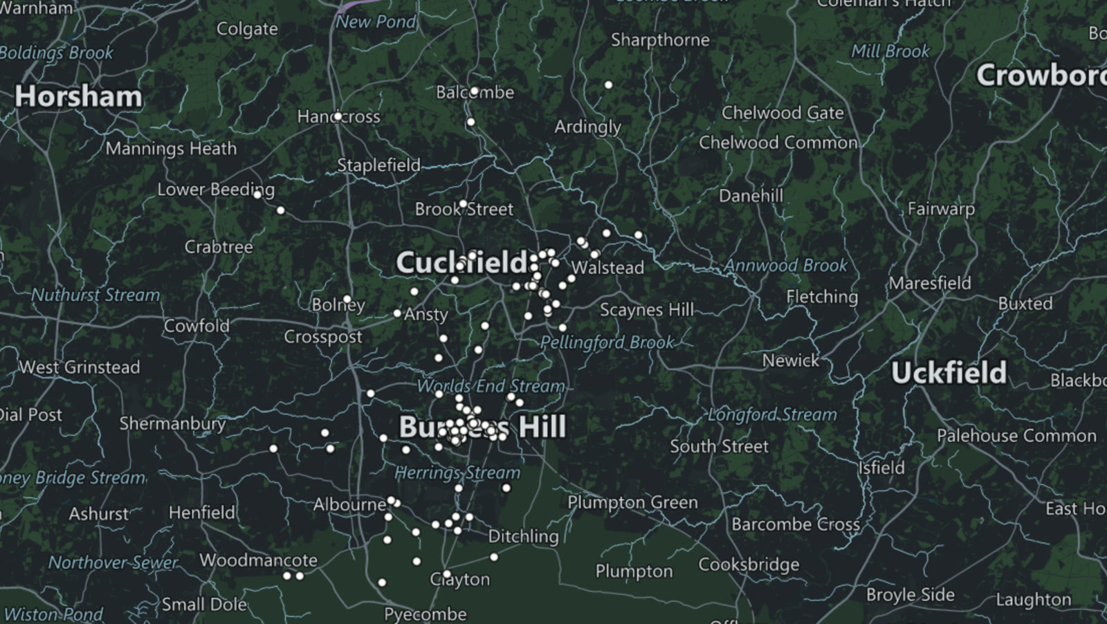 Resolved commercial property addresses across Mid Sussex on a dark basemap